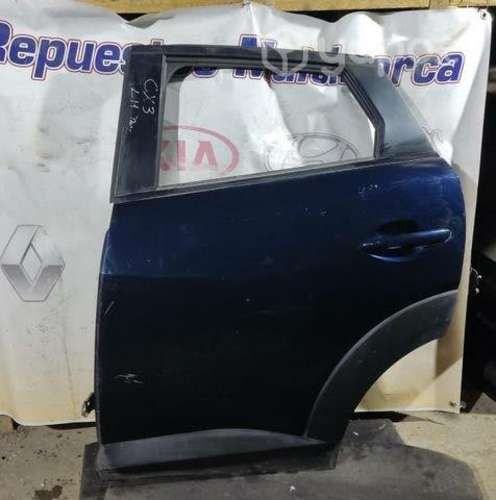 Puerta trasera izquierda Mazda Cx3 solo lata