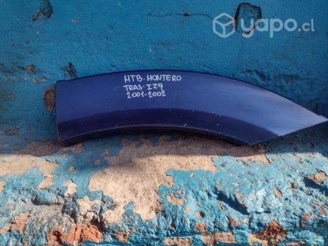 Moldura tras izq Mitsubishi Montero 2001-2002