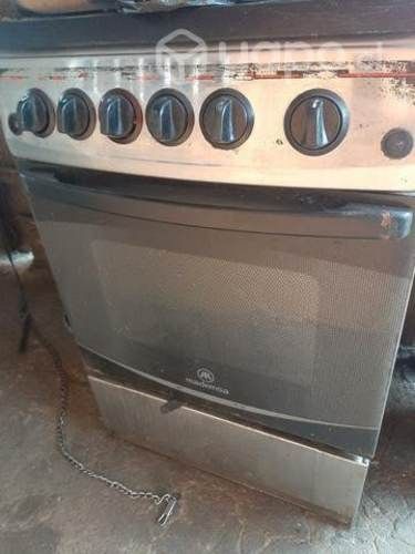 Cocina 4 platos horno impecable