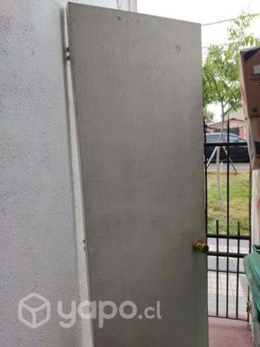 Puerta de casa buen estado mides 65+2mts