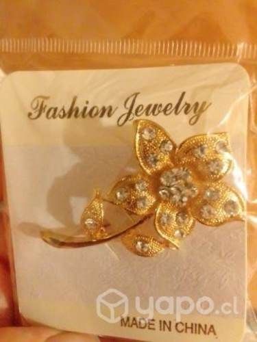 Prendedor flor dorado brillos fantasia
