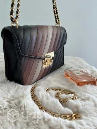 Cartera michael kors 100%