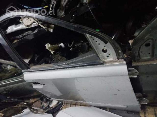 Puerta delantera derecha kia gran carnibal