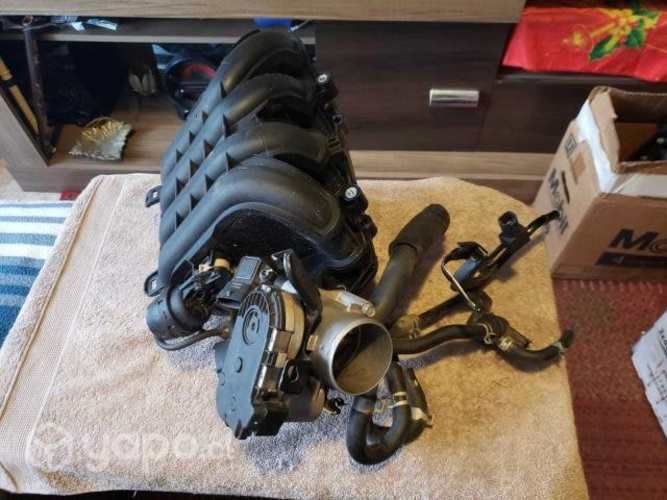 Múltiple de admisión con cuerpo de mariposa