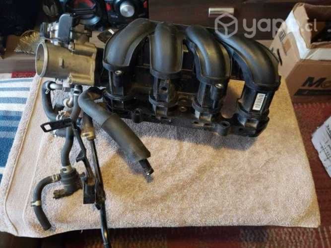 Múltiple de admisión con cuerpo de mariposa