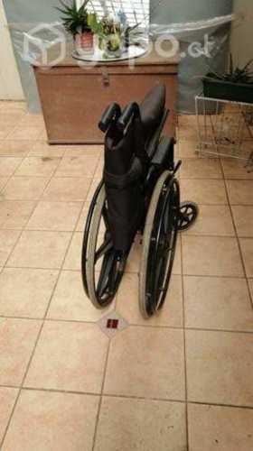 Silla ruedas prácticamente nueva con respaldo
