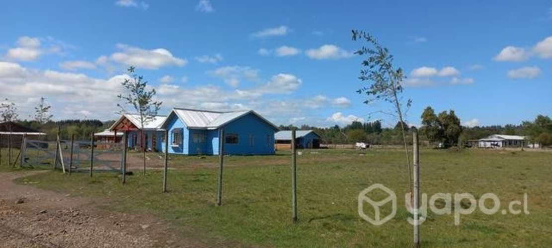 Parcela con casa 6000UF