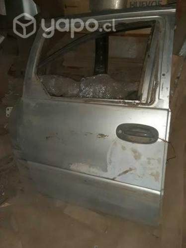 Puerta de corredera chrysler caravan 97-01