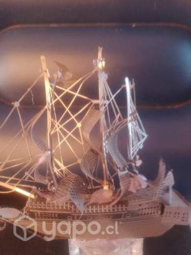 Boleto metálico del Titanic con moneda del Titanic