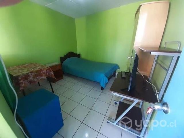 Pieza amoblada arica