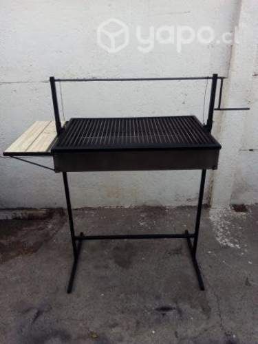 Parrilla a carbón artesanal con manivela