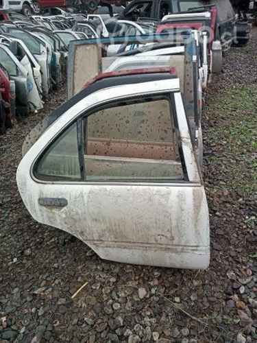 Nissan sentra 2 puerta trasera derecha envio regs