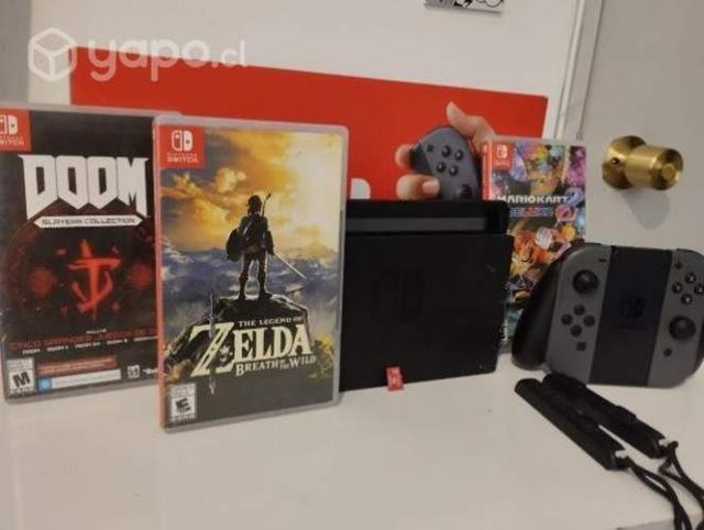 Nintendo switch + tarjeta ssd 64gb + 3 juego