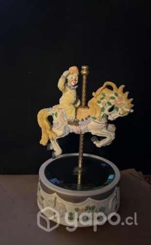 Figura musical vintage. Payaso con caballito