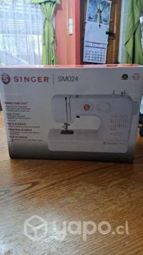 Maquina de coser nueva sin uso