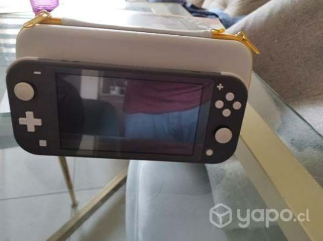 Switch Lite más funda todo original