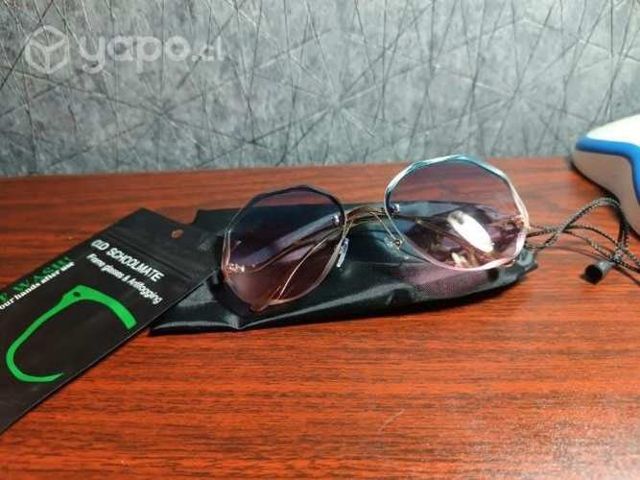 Lentes de sol rosados con celeste