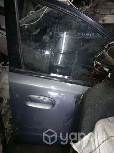 Puerta delantera derecha kia río jb 2010