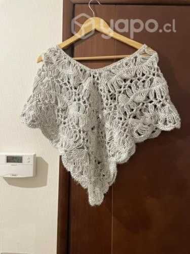 Ponchito gris claro usado