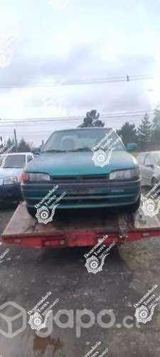 Parachoque delantero mazda 323 año 1997