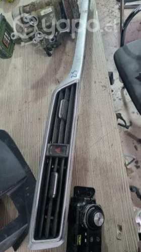 Embellecedor central interior con boton mg zs 202