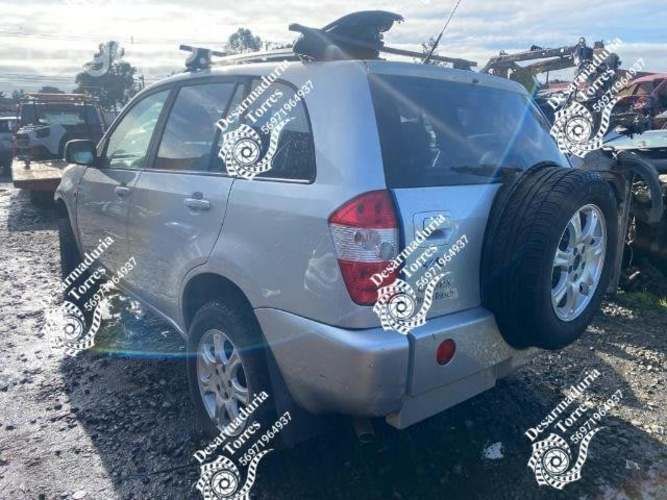 MAnilla exterior trasera izquierda tiggo 2014