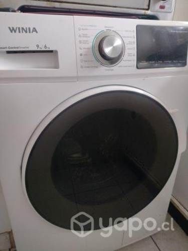 lavadora secadora casi nueva . Por apuro