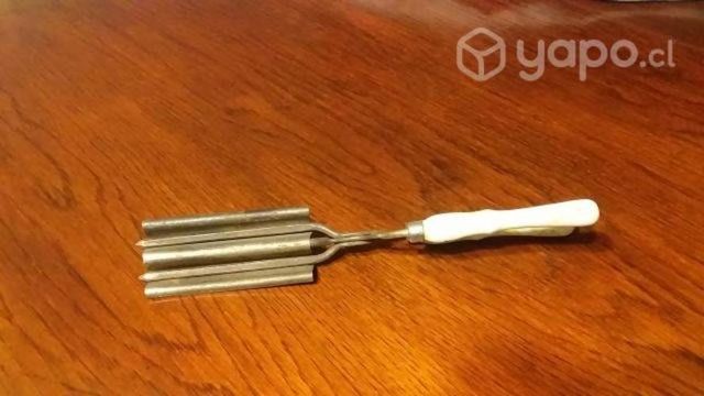 Rizadora de cabello antigua