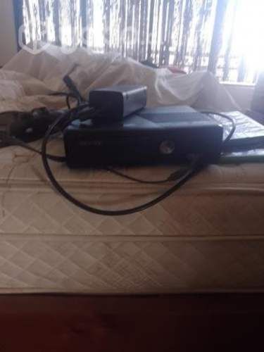 consola xbox 360con tres juego más un cob