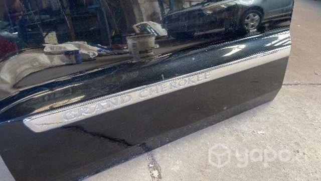 Puerta izquierda Grand Cherokee 2013