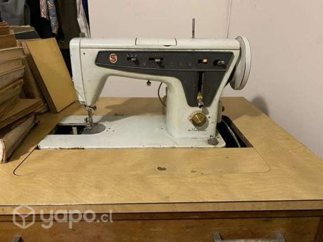 Maquina de coser singer 666