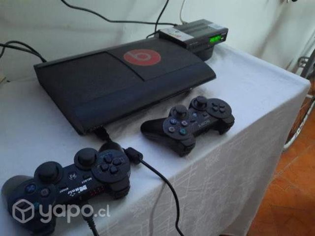 PS3 con accesorios y juegos