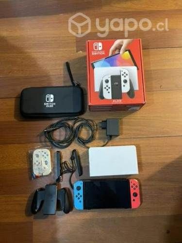 Nintendo switch oled + 2 juegos + accesorios
