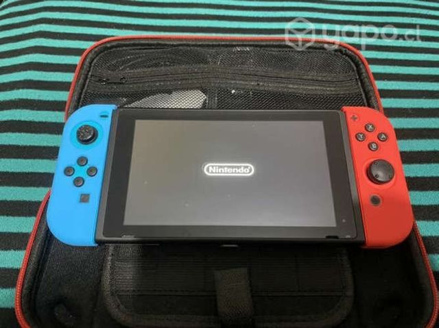 Nintendo switch excelente estado, incluye 4 juegos