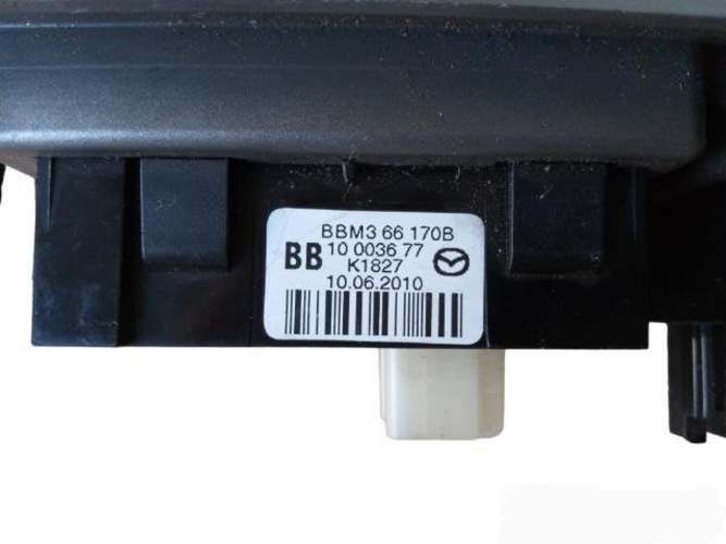 Embellecedor Comando de Luces Mazda 