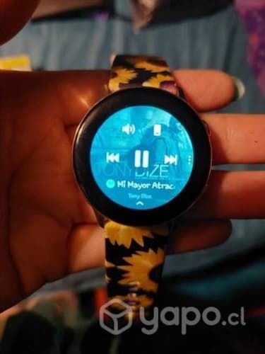 Reloj Samsung y notebook