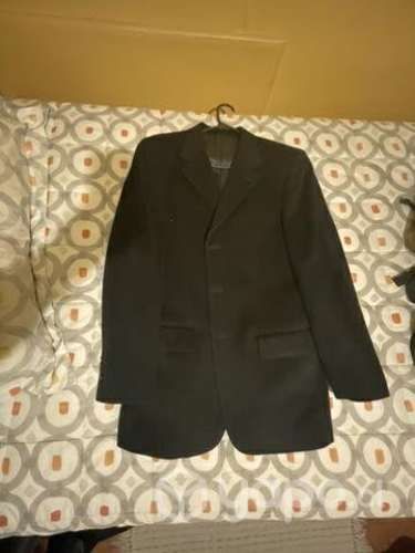 Excelente chaqueta Saville Row talla 50