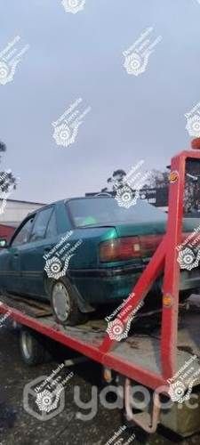 Puerta trasera izquierda mazda 323 año 1997