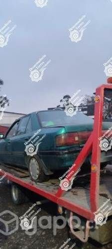 Parachoque trasero mazda 323 año 1997