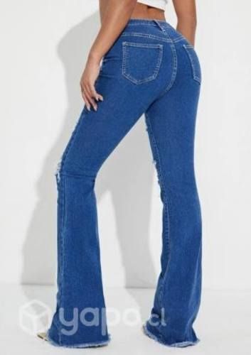 Jeans de pierna amplea diseño desgarrado