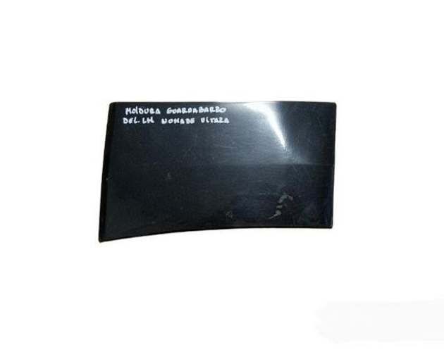 Continuación Tapabarro Izquier Suzuki Grand Nomade