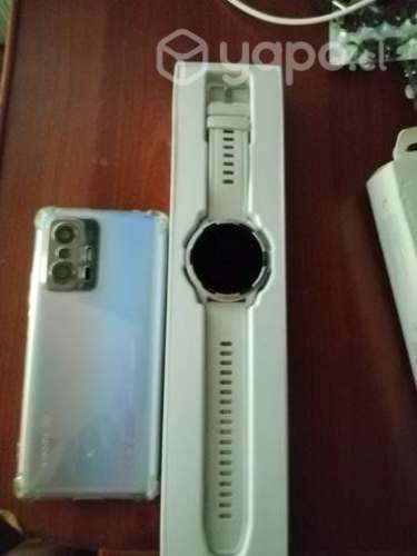 Celular Xiaomi y reloj