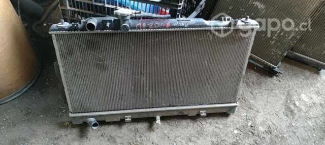 Radiador de agua mazda 6 mec