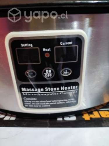 Olla con piedras termales