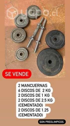 Mancuernas y discos preolimpicos