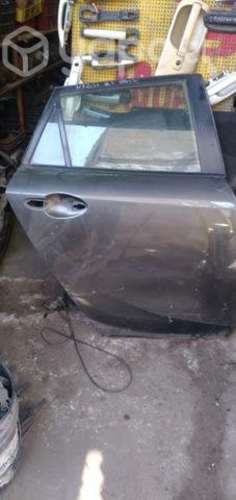 Puerta trasera derecha madaz 3 espor 2009