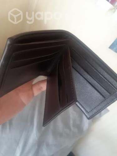 Billetera nueva y audífonos motorola