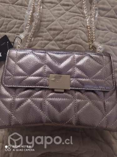 Linda cartera marca Dune, nueva