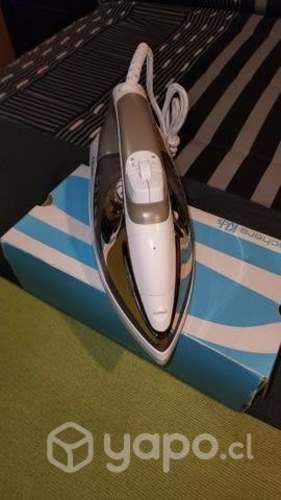 Plancha a vapor oster teflon