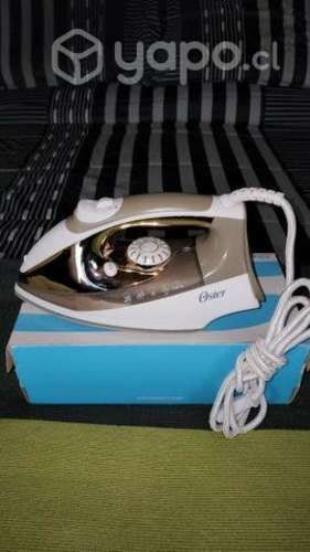 Plancha a vapor oster teflon